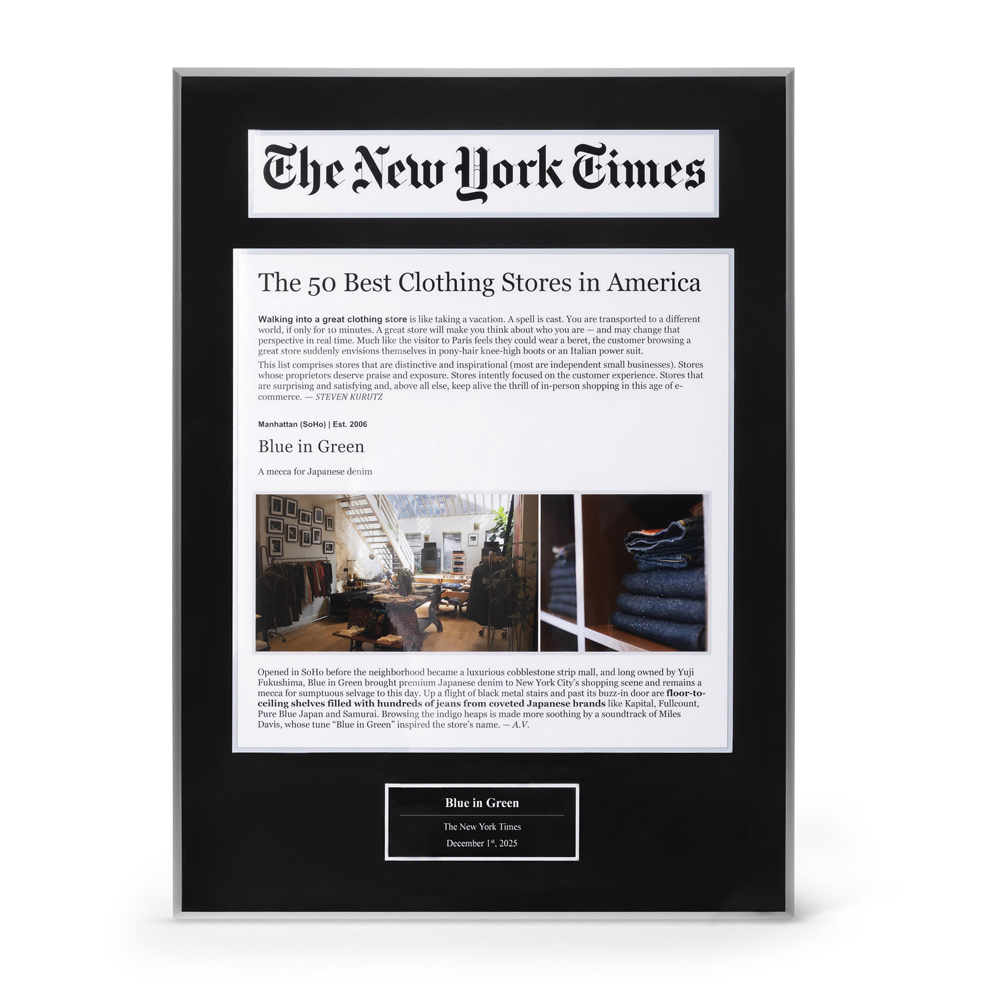 Custom engraved plaque with a framed newspaper feature, shown mounted on a dining room wall